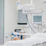 photo of a white surgery room with equipment